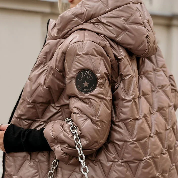 Funktionale Damen Steppjacke mit Kapuze. Leicht, wasserabweisend und warm, ideal als Übergangsjacke.