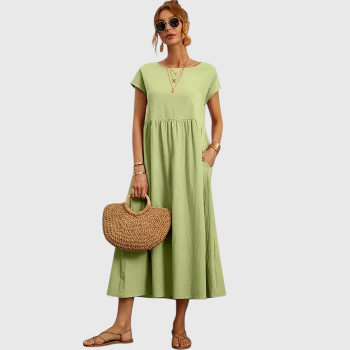 Entspanntes Sommer-Midikleid für Damen, lockerer Schnitt, Kurzarm, perfekt für warme Tage.