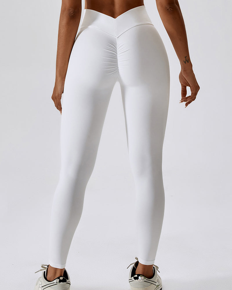 Vordere Ansicht der Damen Fitness Leggings. Zeigt den stilvollen V-Bund und die komfortable High Waist Passform.