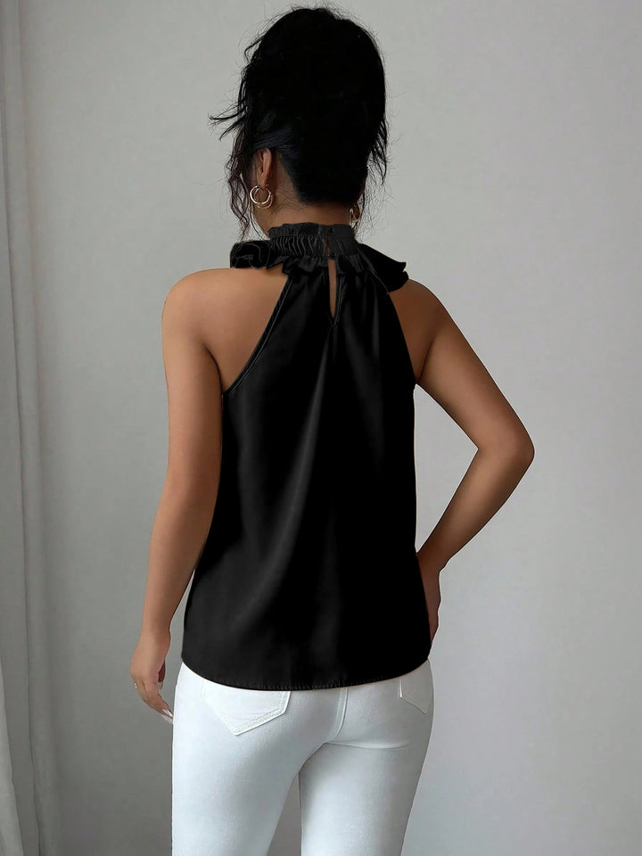 Festliche Damen Rüschenbluse mit Stehkragen, ärmellos, in klassischem Design für Abendgarderobe.