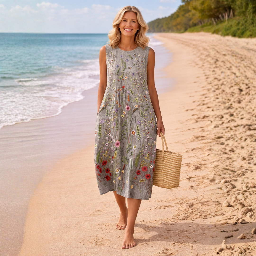 Elegantes Damen Midikleid für Hochzeitsgäste, mit sommerlichem Blumenmuster und taillierter Passform.