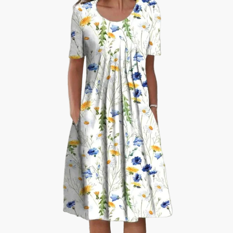 Luftiges Damen Freizeitkleid mit floralem Muster. Lockere Passform & praktische Taschen, ideal für den Sommer.
