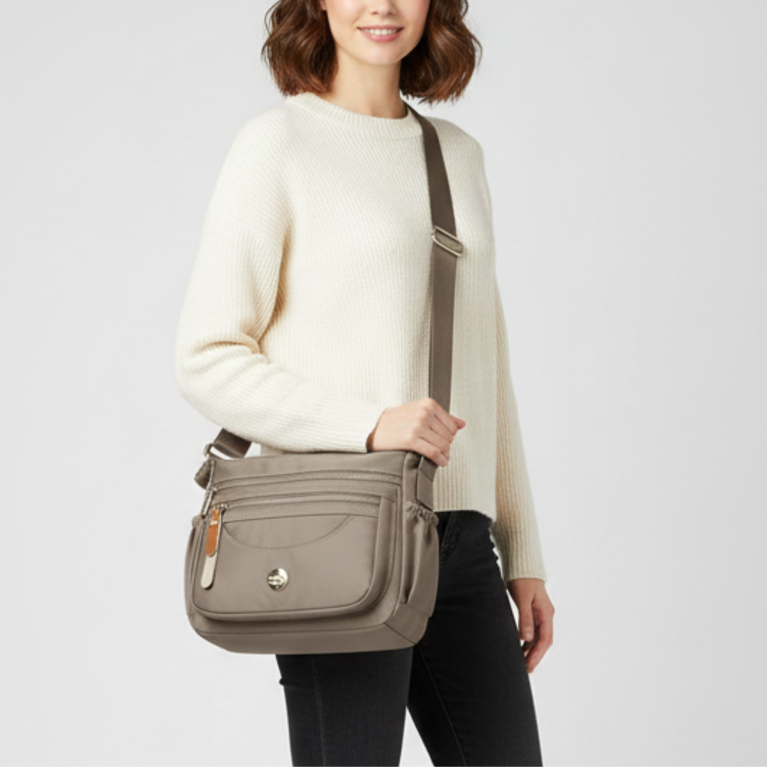 Rosa Unisex Alltagstasche aus Nylon. Kompakte Crossbody-Tasche für Reisen und Organisation.