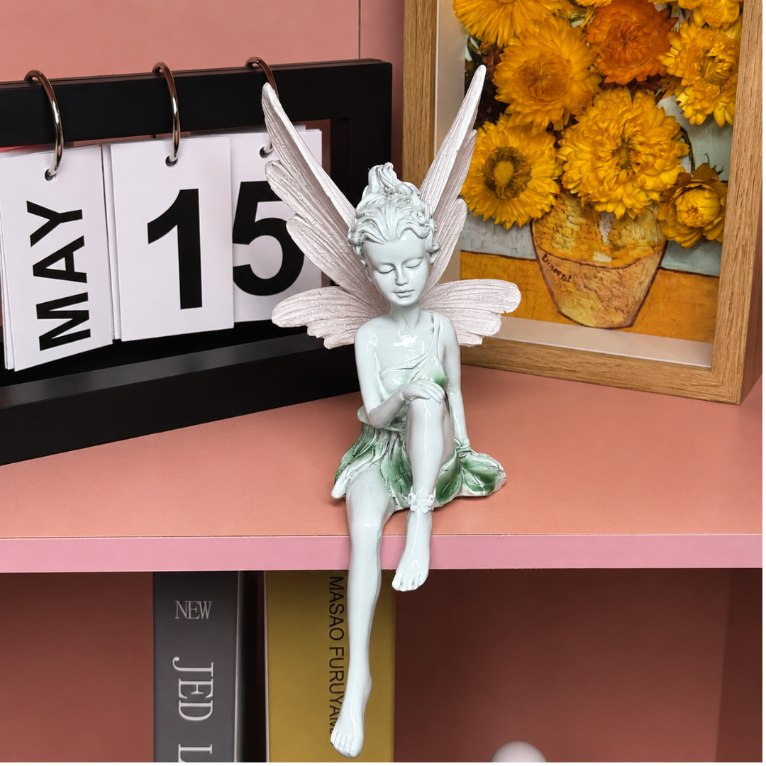 Detaillierte schlafende Elfenfigur aus Resin. Gartenfigur in Kupferoptik mit Flügeln für Außen- und Innenbereich.