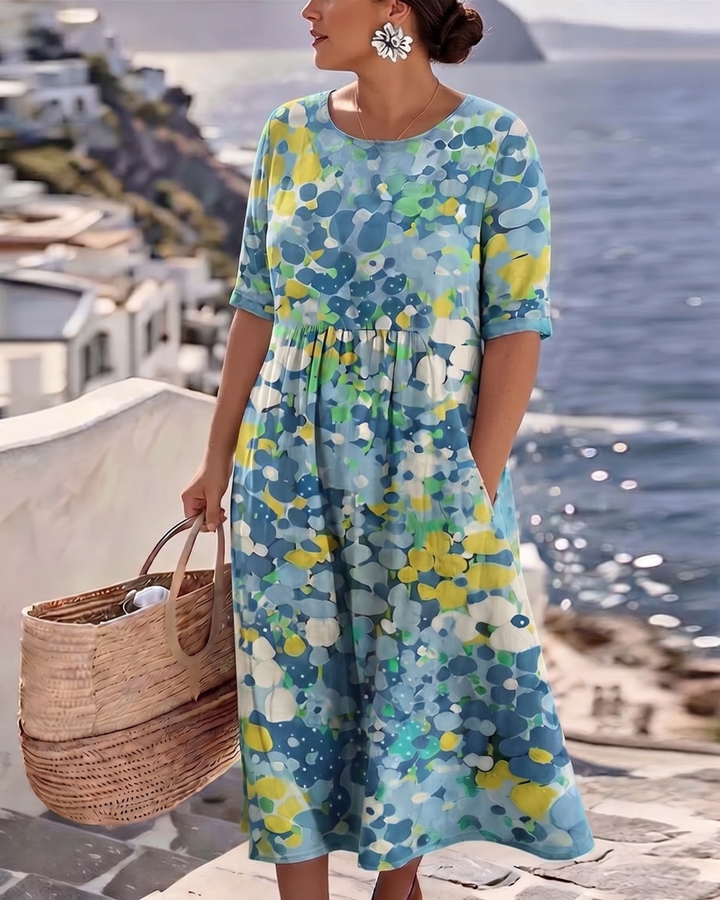 Elegantes Damen Sommerkleid, A-Linie, mit farbenfrohem Blumenprint und lockerem Schnitt.