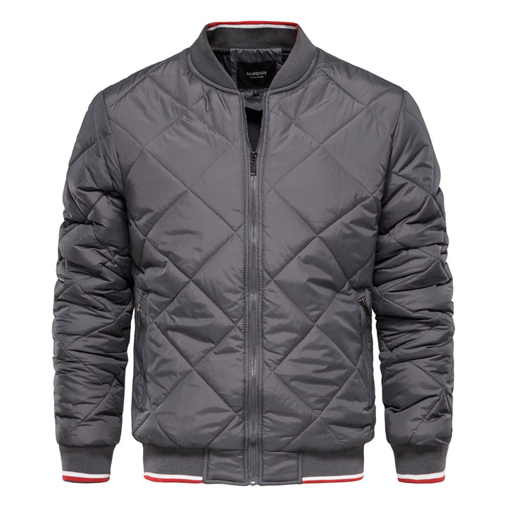 Dunkelgraue Herren Winter Steppjacke mit hohem Stehkragen. Perfekt für lässige Wintermode und Komfort.