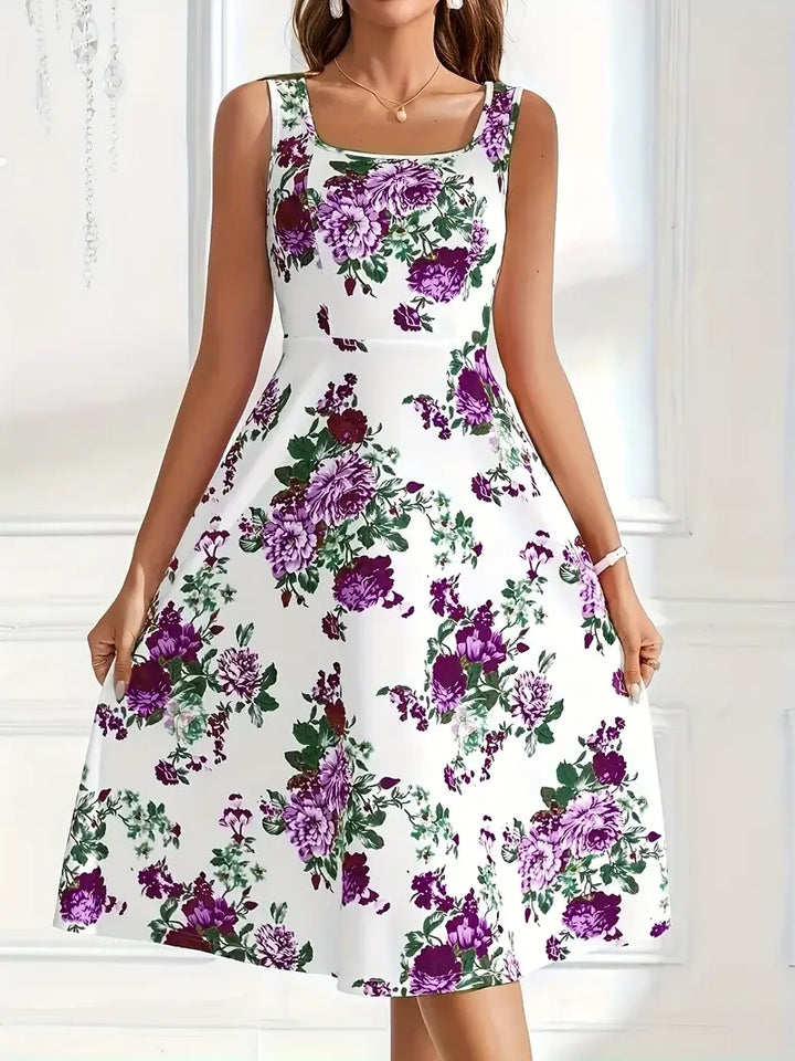 Modisches Damen Midikleid mit Blumenmuster, das Vielseitigkeit und Stil für jede Gelegenheit bietet.