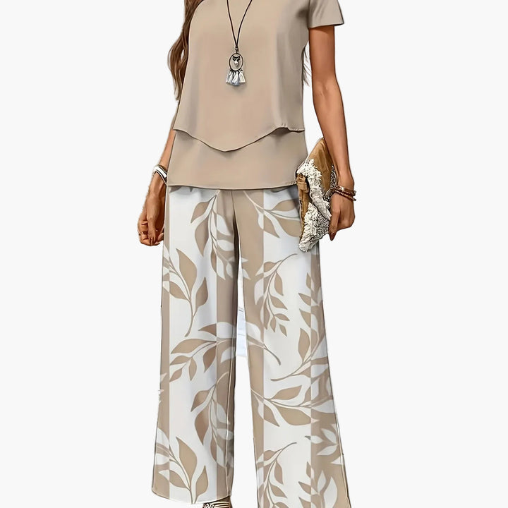 Elegantes Freizeit-Damen-Set: Zweiteiler mit weiten Hosen & Kurzarmshirt, ideal für sommerliche Anlässe.