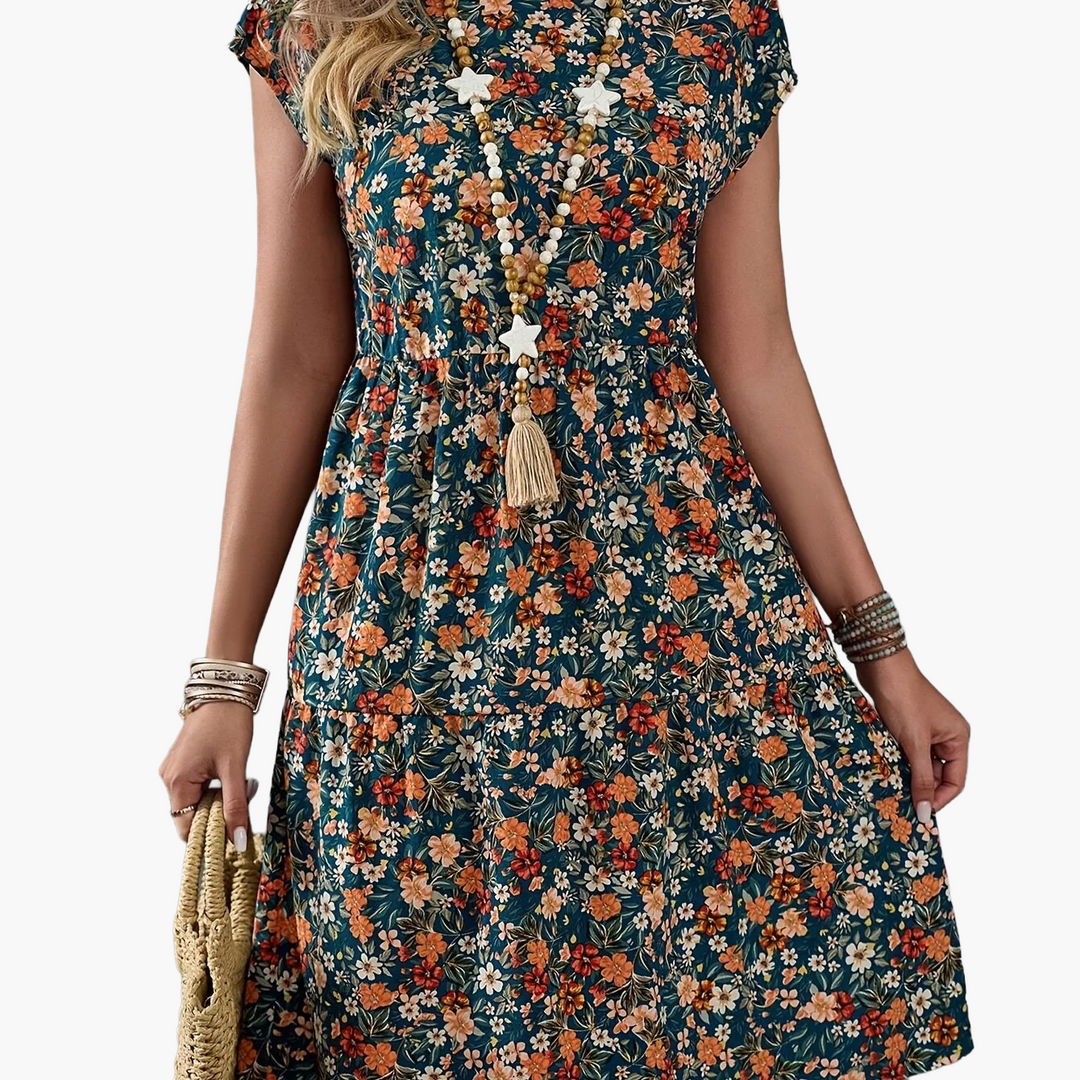 Vielseitiges Damen Kurzarm-Sommerkleid, knielang, mit Blumen. Für Alltag, Strand und sommerlichen Urlaub.