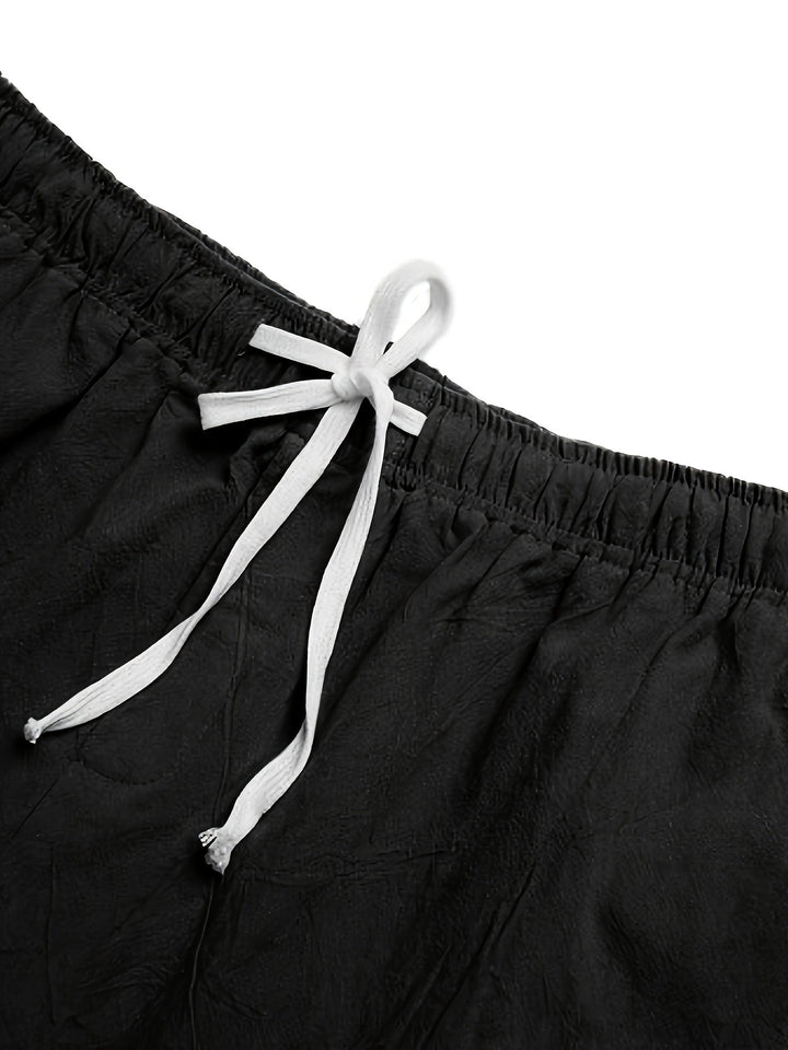 Hochwertige Herren Badeshorts mit elastischem Kordelzugbund für besten Komfort.