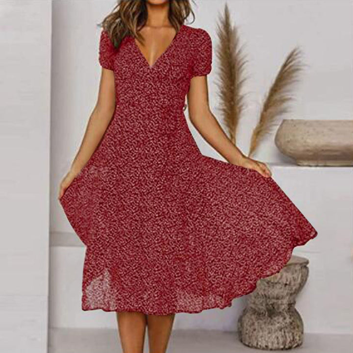 Trendiges Damen Wickel-Midikleid. Elegantes Sommerkleid mit Puffärmeln & V-Ausschnitt, ideal für Freizeit & Abend.