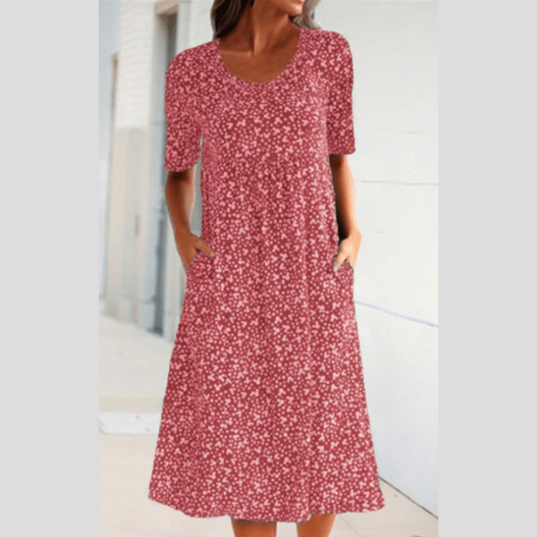 Fließendes A-Linien-Midikleid für Damen mit elegantem Blumenprint, schmeichelhaft und bequem, ideal als Freizeitkleid.