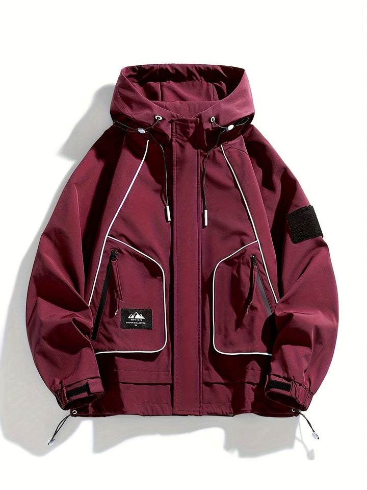 Burgunderrote Unisex Kapuzenjacke für Herren & Damen. Robuste Reißverschlussjacke, ideal als Übergangs- oder Sportjacke.