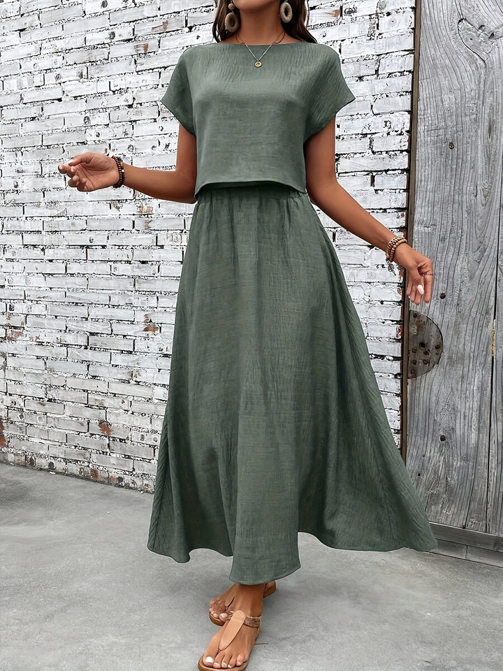 Komplettes Damen Zweiteiler Set: Trendiger Sommer-Look mit Croptop & Maxirock. Elegant & modern.