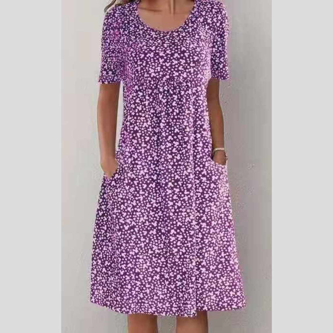 Stilvolles Damen Freizeitkleid, Midikleid mit elegantem Blumenmuster, bequeme Passform für entspannte Sommertage.