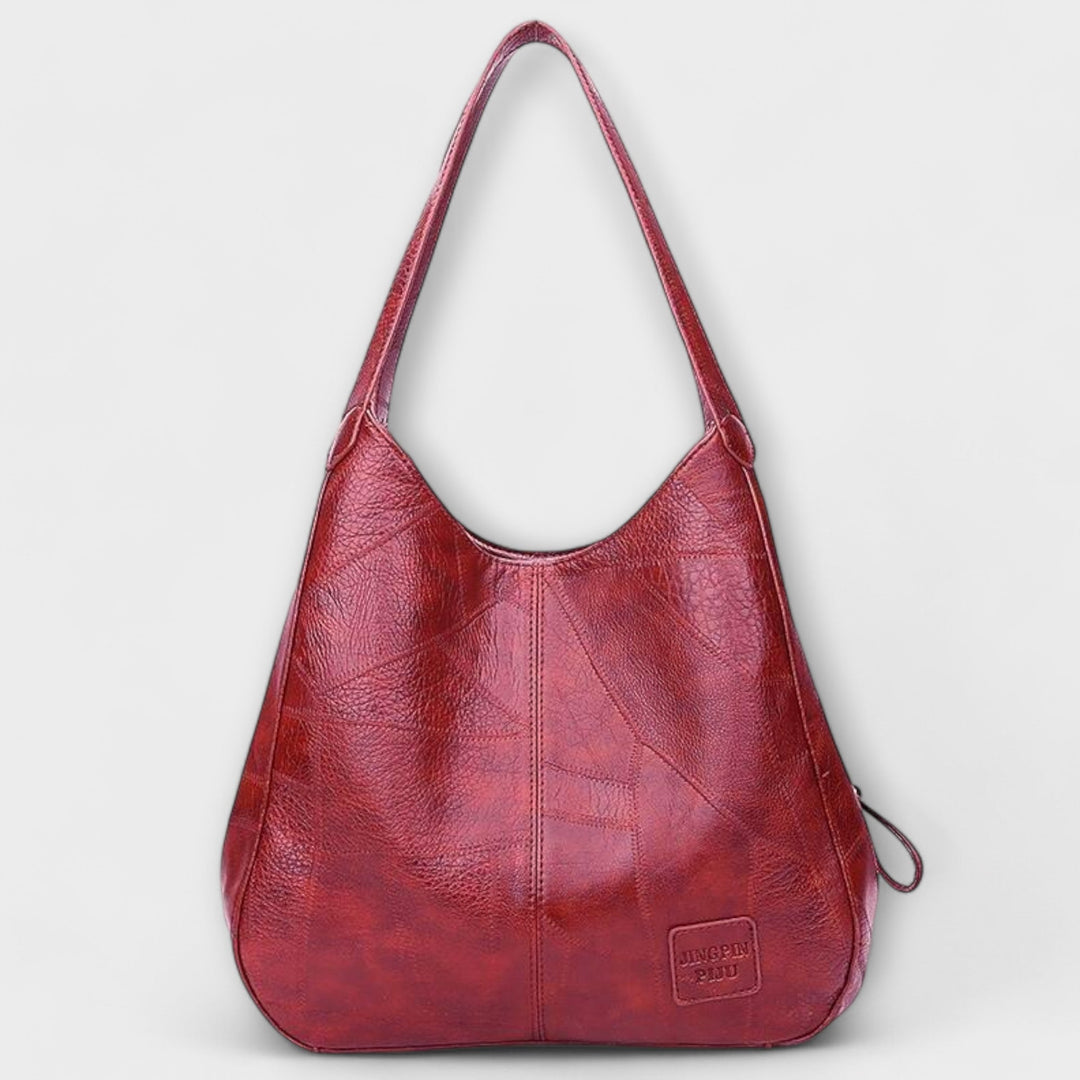 Geräumige braune Vintage Ledertasche, unisex, mit Fächern für Business- & Alltagsutensilien.