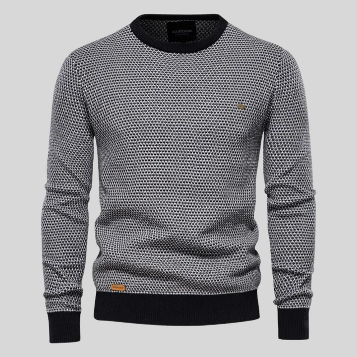Schwarzer Herren Strickpullover mit Rundhalsausschnitt. Warmer, vielseitiger Langarm Pullover für kalte Tage.