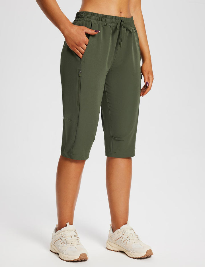 Damen Wander-Capris, bewegungsfreundlich, mit praktischen Reißverschlusstaschen.