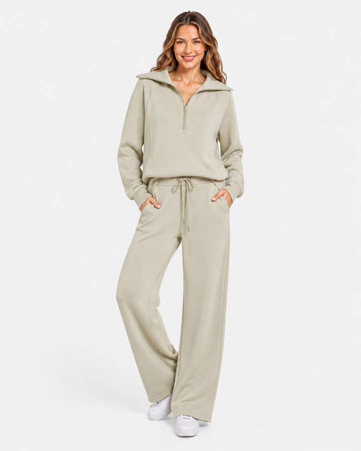 Gemütlicher Damen Zweiteiler für entspannte Momente: Reißverschlusskragen-Sweatshirt & weite Hose.