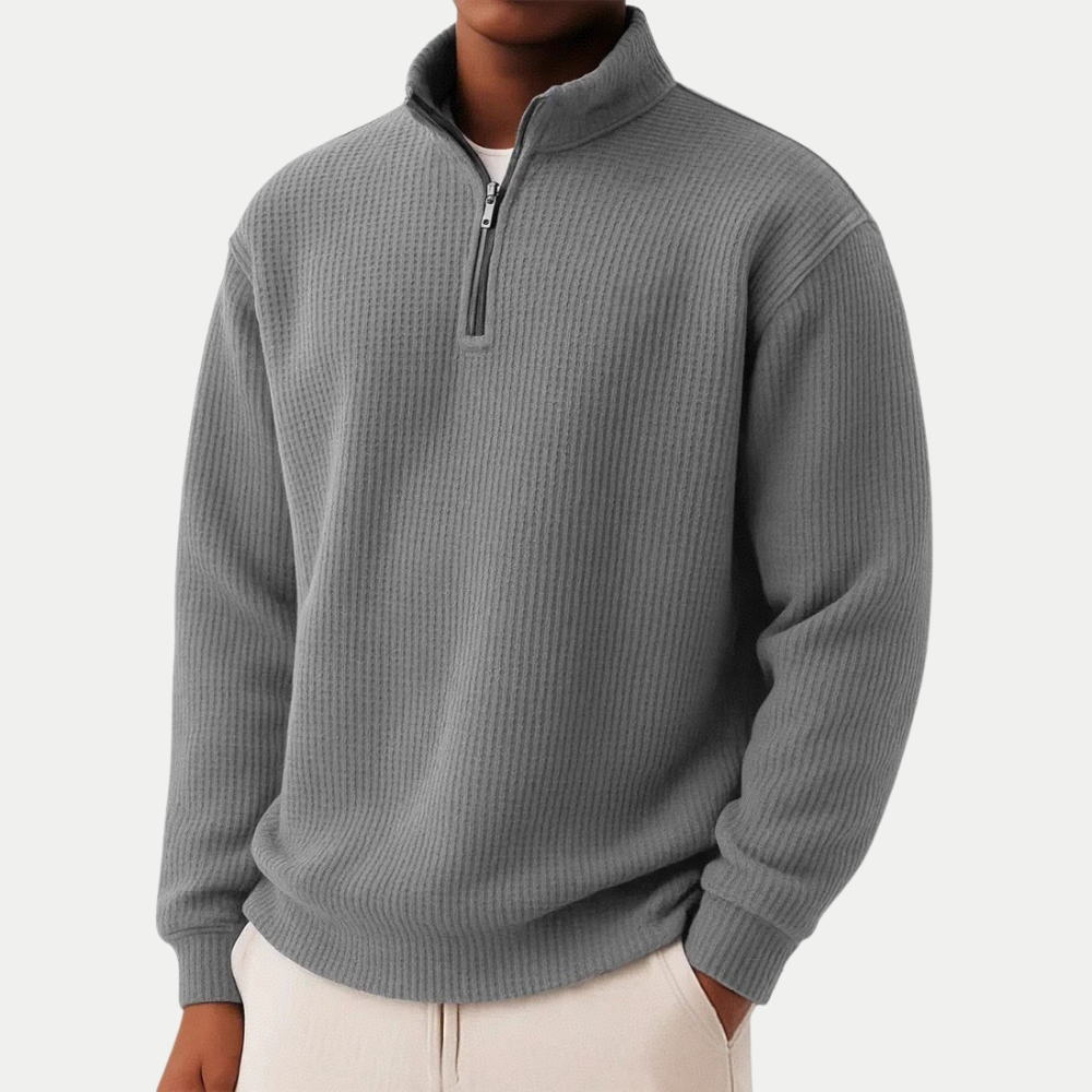 Mann trägt eleganten Herren Reißverschluss Pullover mit Stehkragen, bequemer Langarm-Sweater für Freizeit.