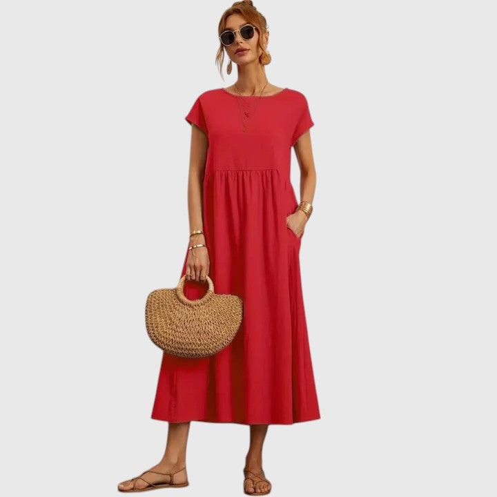 Fließendes Damen Midikleid in lockerer Passform mit Rundhals und kurzen Ärmeln.