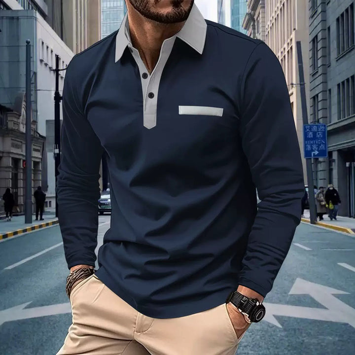 Elegantes marineblaues Herrenpolo mit Langarm und modernem Kontrastkragen; perfektes Oberteil für Business Casual.