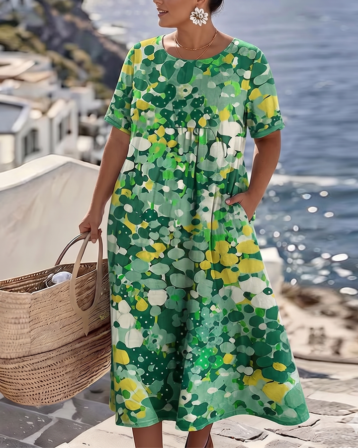 Lockeres Sommer Midikleid für Damen, mit lebhaftem Blumenmuster, schmeichelhaft & stilvoll.