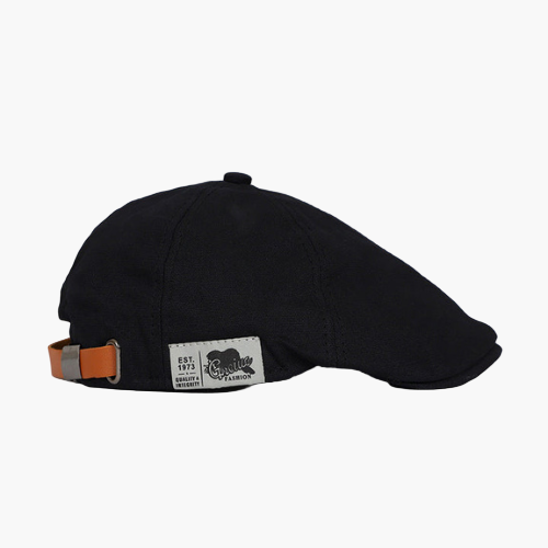Elegante Herrenmütze: Eine klassische Schiebermütze in Dunkelblau, ideal für Herbst- & Wintermode.