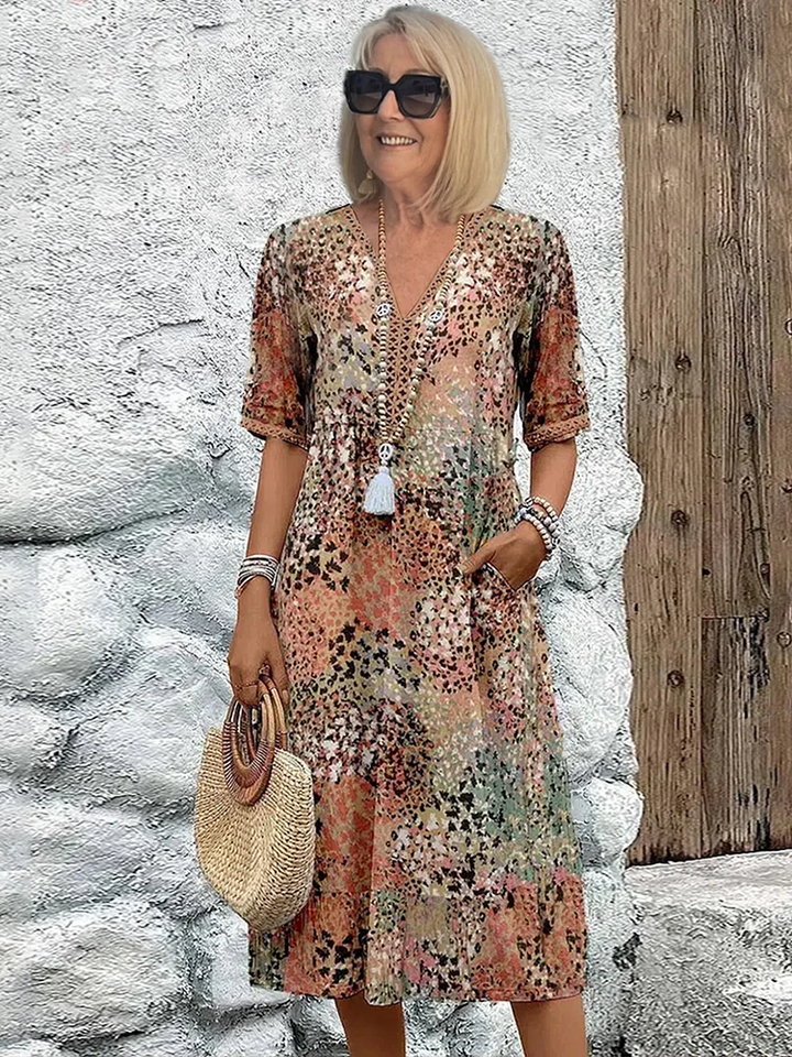 Damen Blumen Midikleid mit V-Ausschnitt, elegante A-Linie. Perfektes Sommer-Freizeitkleid.