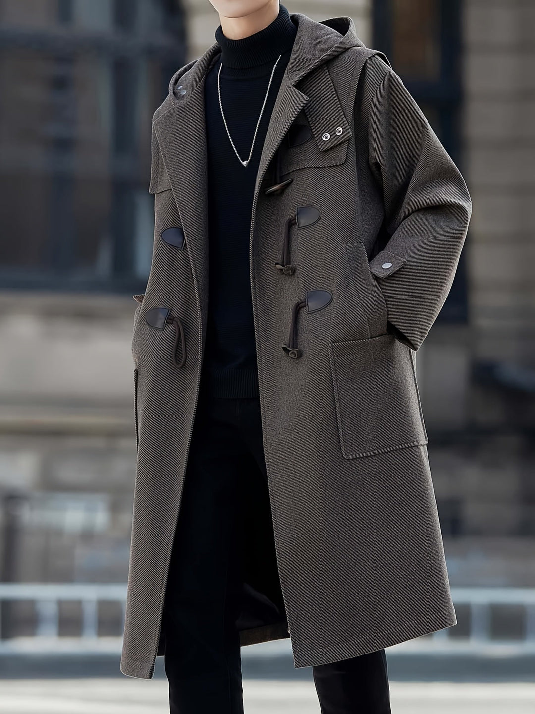 Detail: Knebelverschluss am Herren Dufflecoat mit Kapuze, hochwertige Winterjacke für Herren.