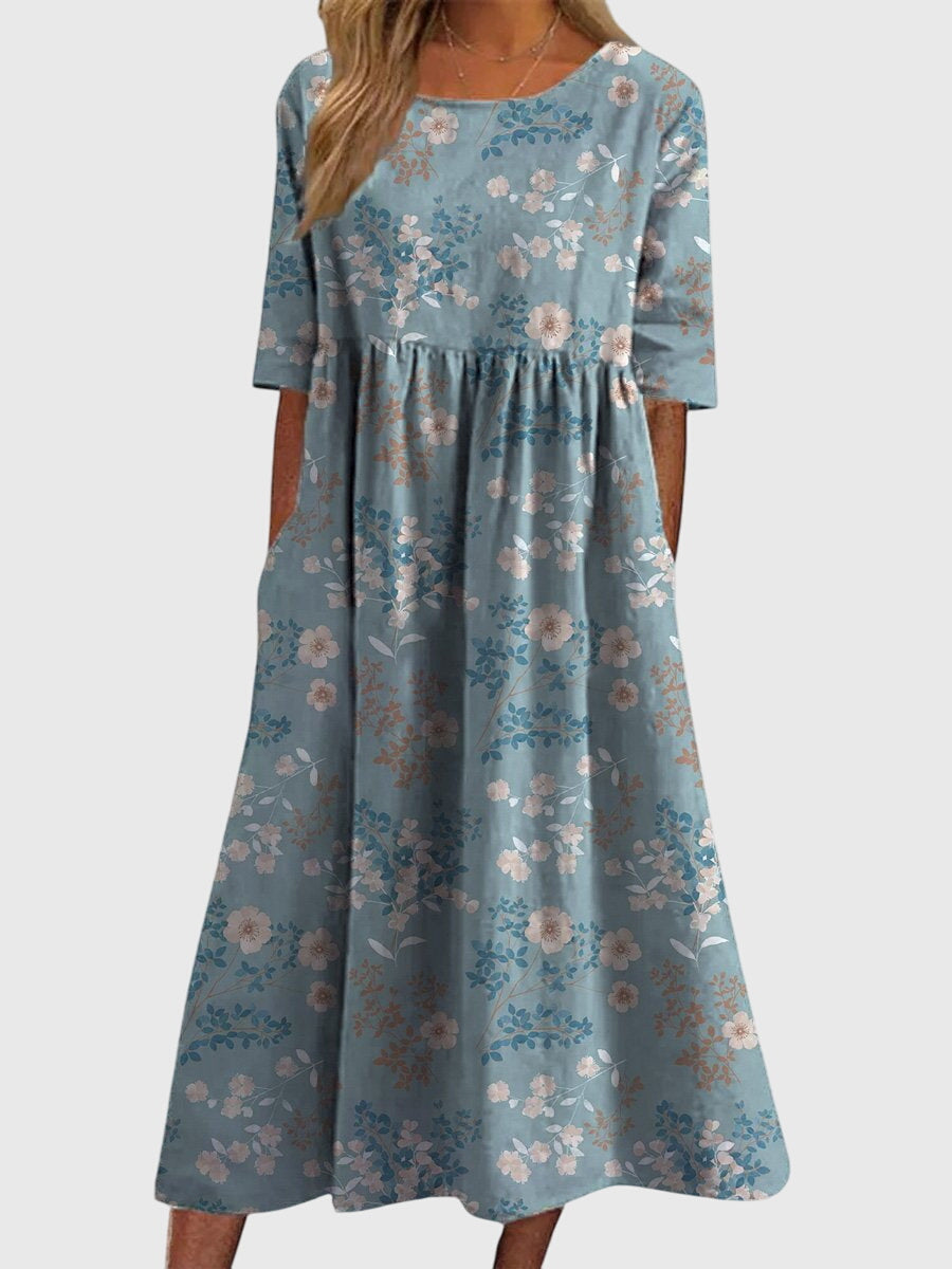 Rückenansicht eines eleganten Damen Maxikleides, das eine schmeichelhafte und fließende Passform offenbart.
