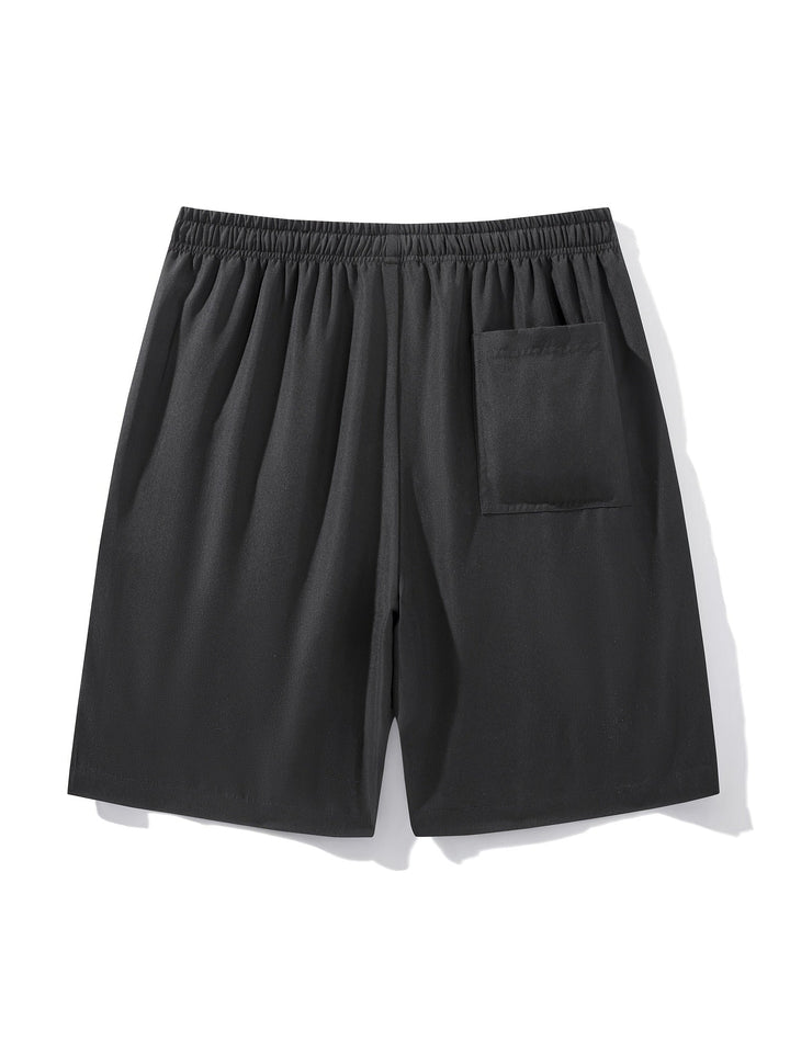 Schwarze Herren Freizeitshorts mit Kordelzug & Reißverschlusstaschen. Bequeme Sommerbekleidung.