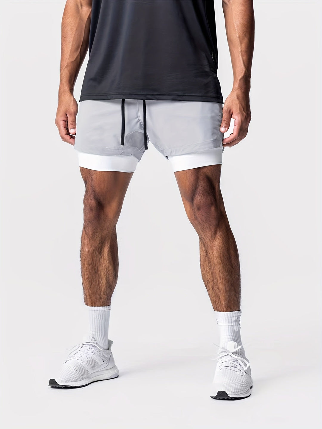 Leichte Herren Trainingshose 2-in-1, kurze Activewear für Laufen & Gym.