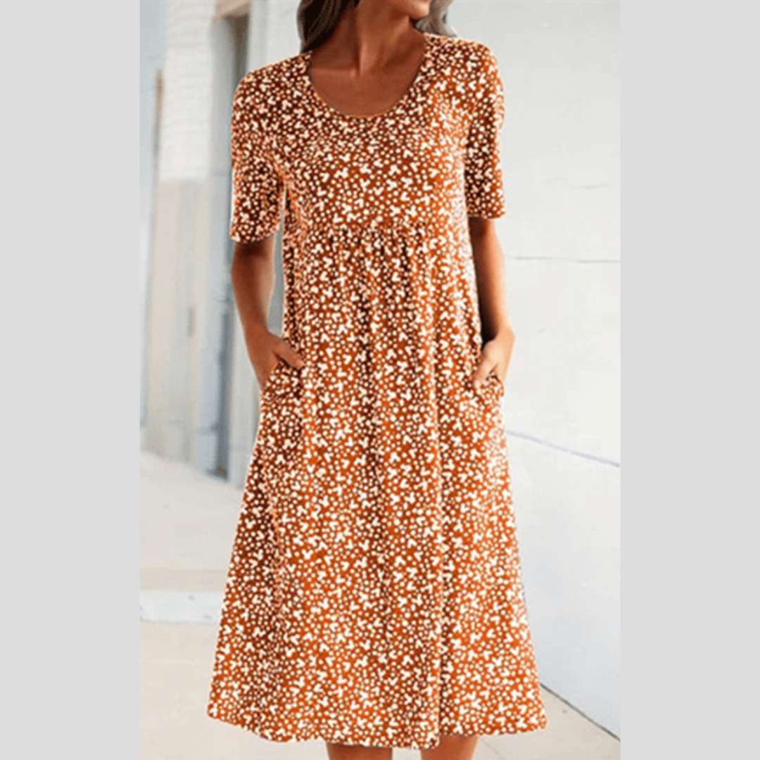 Damen Sonnentanz Midikleid in A-Linie, Blumenmuster, elegant und komfortabel, perfekt als Sommerkleid für jeden Tag.