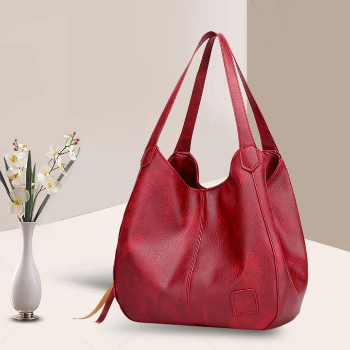 Große Damen Schultertasche aus PU Leder – perfekt als Reisetasche, mit Organizer.