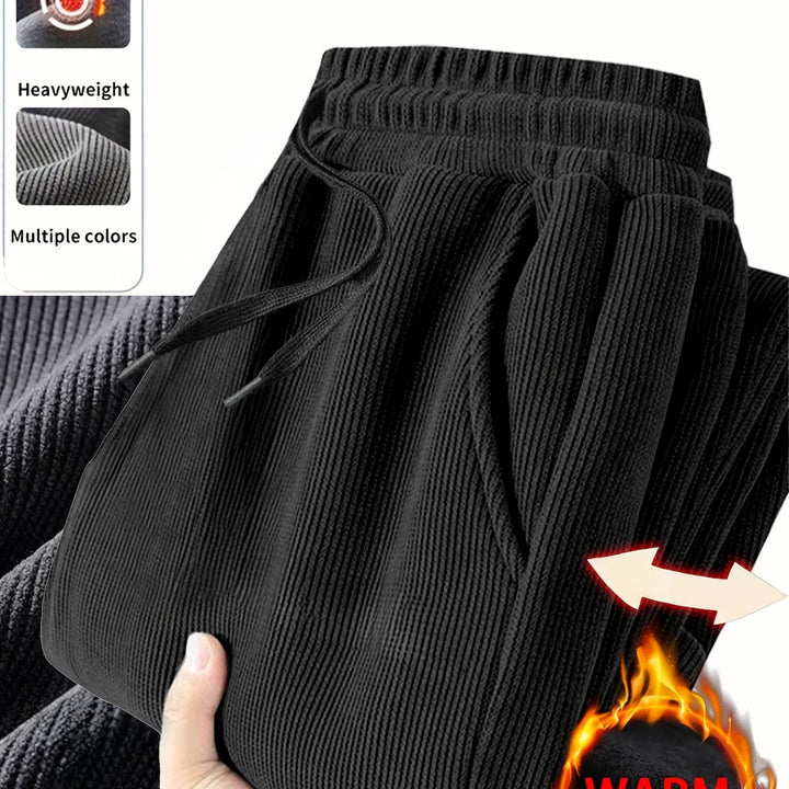 Blaugraue Herren Jogginghose, warm gefüttert, bequem, perfekt als Winterhose für zuhause oder unterwegs.