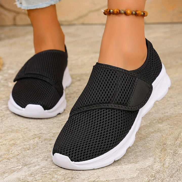 Schwarze Damen Slip-On Sneaker, bequem, leicht und anpassbar für maximalen Komfort.