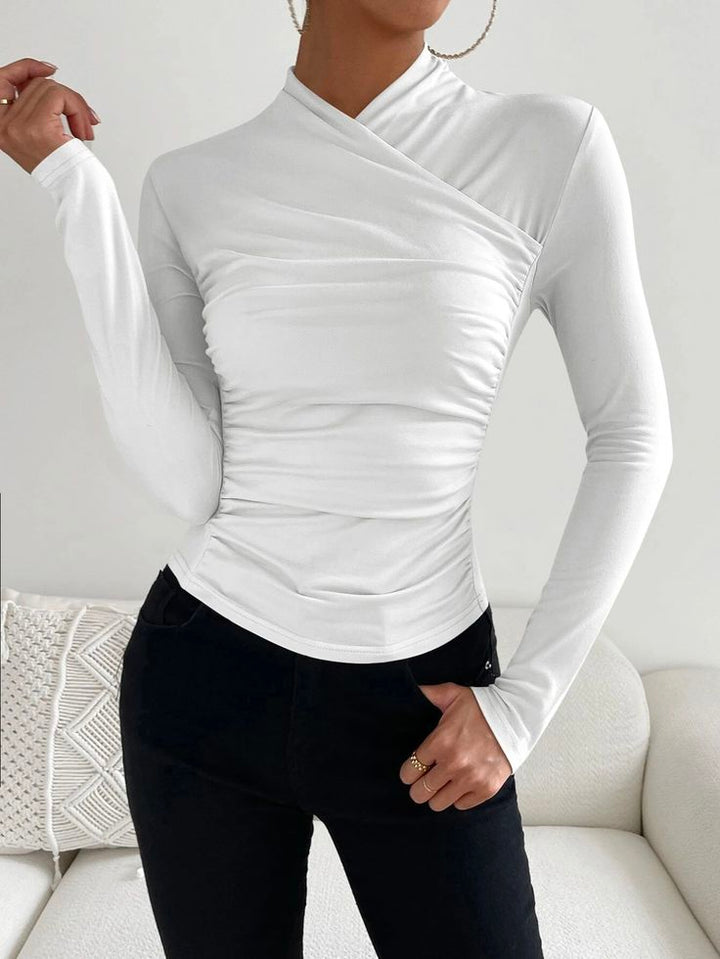 Komfortables weißes Damen Langarmshirt. Perfektes Basic Oberteil für jeden Tag, ideal für Freizeit.