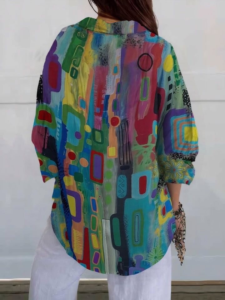 Moderne Damenbluse mit farbigem geometrischen Muster, langer Ärmel, vielseitig für jede Gelegenheit.
