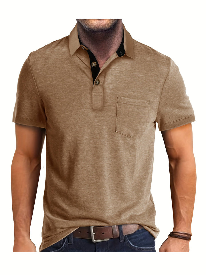 Vielseitiges Herren Poloshirt mit Brusttasche. Klassisches Kurzarm-Modell für stilvolle Frühlings-Looks.