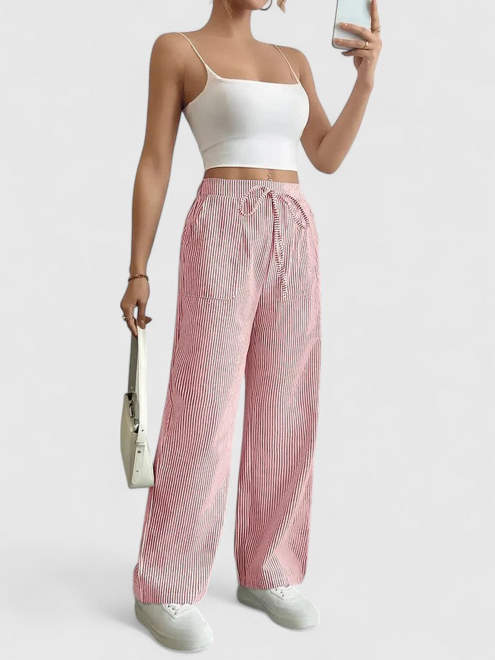 Lässige Damen Wide-Leg Hose für maximalen Komfort. Elastischer Bund, Bindeband & aufgesetzte Taschen.