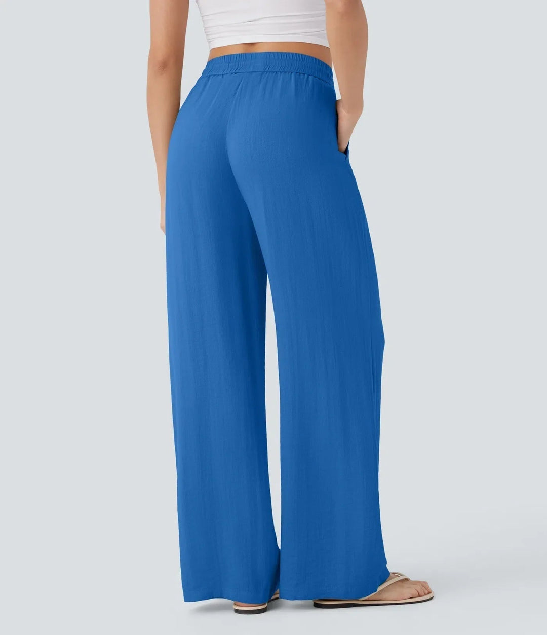 Elegante Damen Sommerhose mit weitem Bein, Kordelzug. Lockerpassform & Seitentaschen. Alltagsmode.