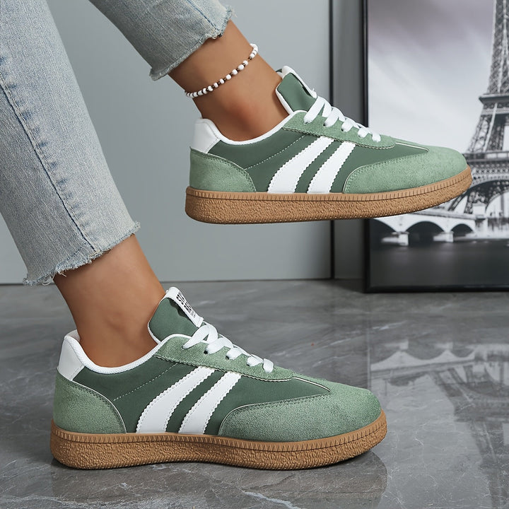 Blaue Damen Retro Sneaker, modische Freizeitschuhe im Vintage-Look für Frauen.