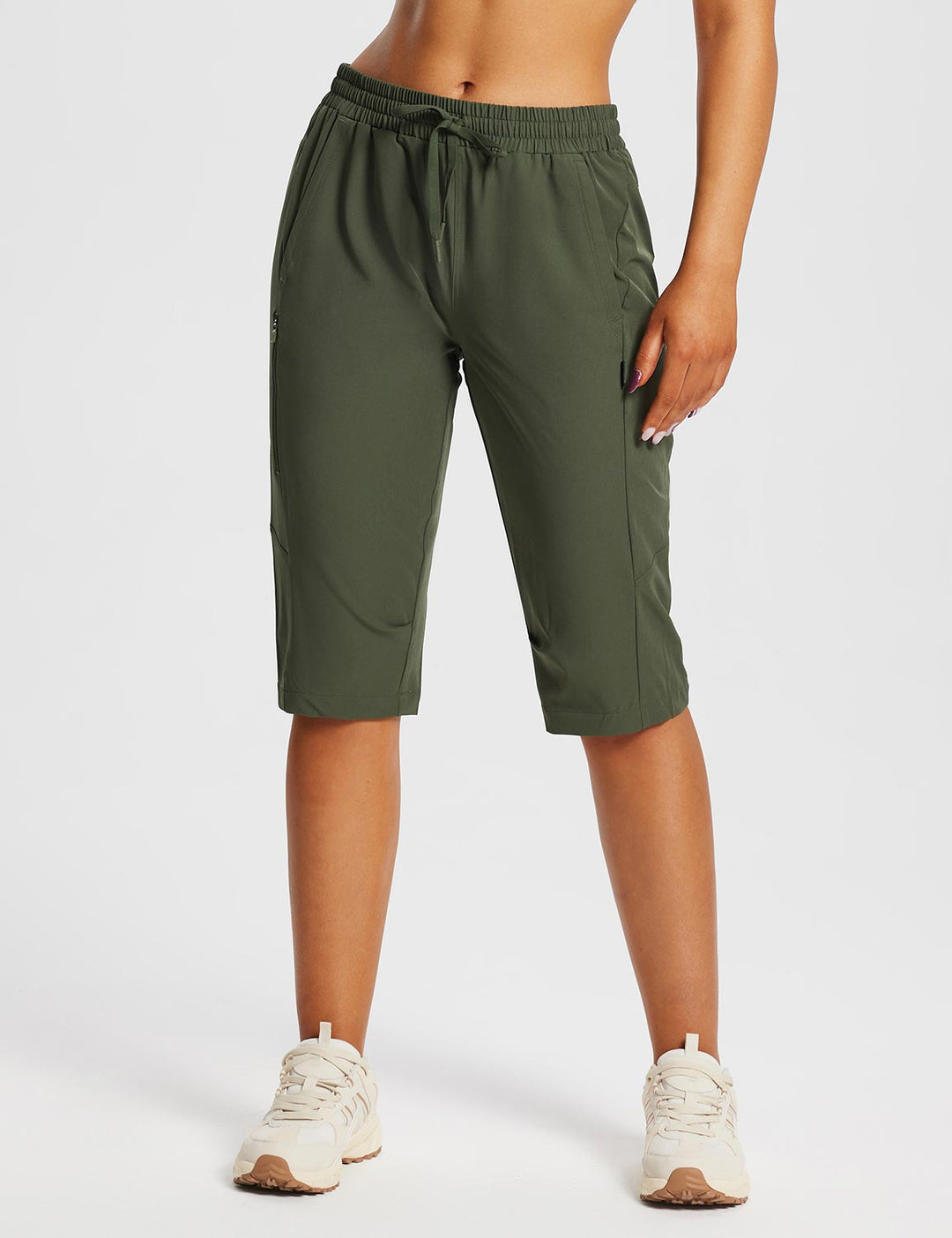 Frauen Outdoor-Capris, schnelltrocknend & pflegeleicht, mit Zip-Taschen.
