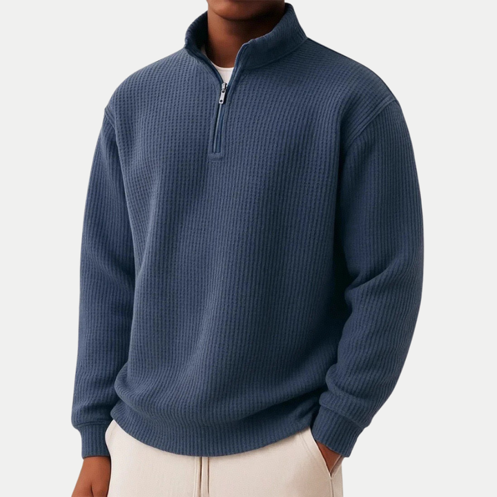 Nahaufnahme: Eleganter Stehkragen & Reißverschluss eines Herren Pullovers, ein bequemes Langarm-Oberteil.