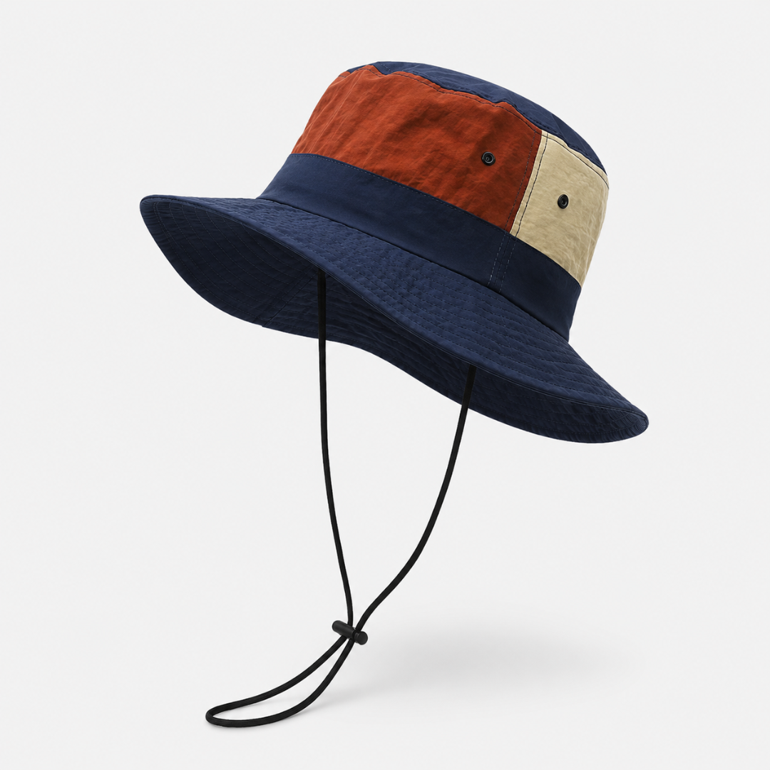 Dunkelblauer Unisex Sommerhut mit breiter Krempe. Schneller Trocknung und UV-Schutz für Outdoor-Abenteuer.