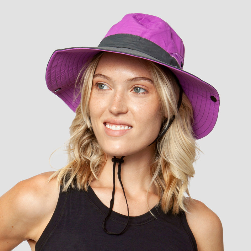 Faltbarer Damen Strandhut Liane mit UV-Schutz. Ideal für Reisen, mit praktischer Pferdeschwanzöffnung.