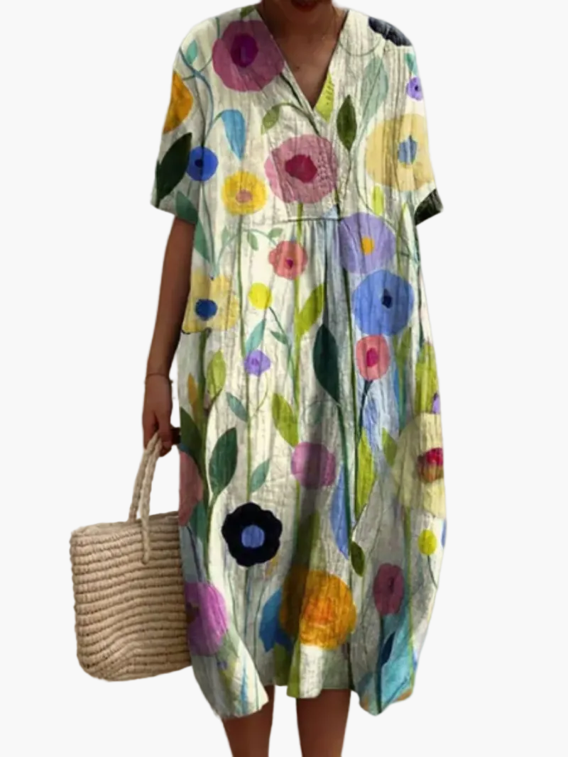 Lockeres Freizeitkleid für Damen, Vintage-Optik, florales Design, kurze Ärmel, ideal für warme Sommertage.