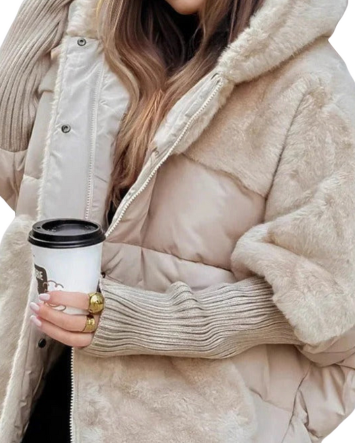 Modische Damen Winterjacke mit Kapuze. Bietet maximalen Kälteschutz und Wärme für den Winter.
