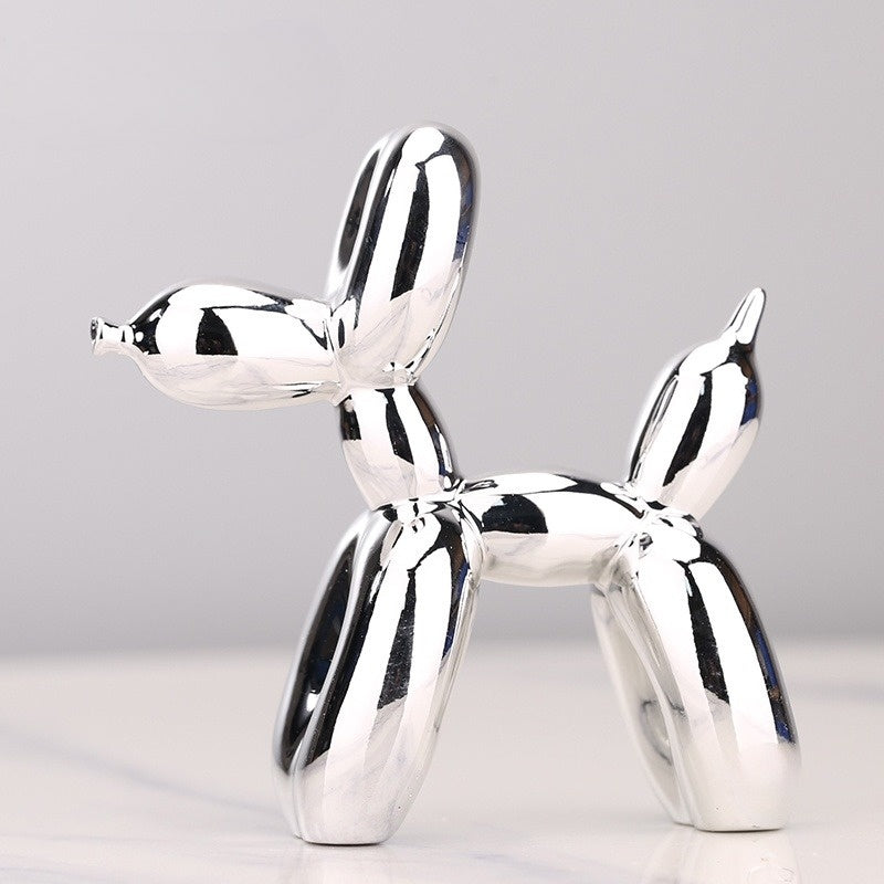 Einzigartige Ballonhund Deko Skulptur als modernes Geschenk. Farbig, glänzend und aus Kunstharz für Innenbereich.